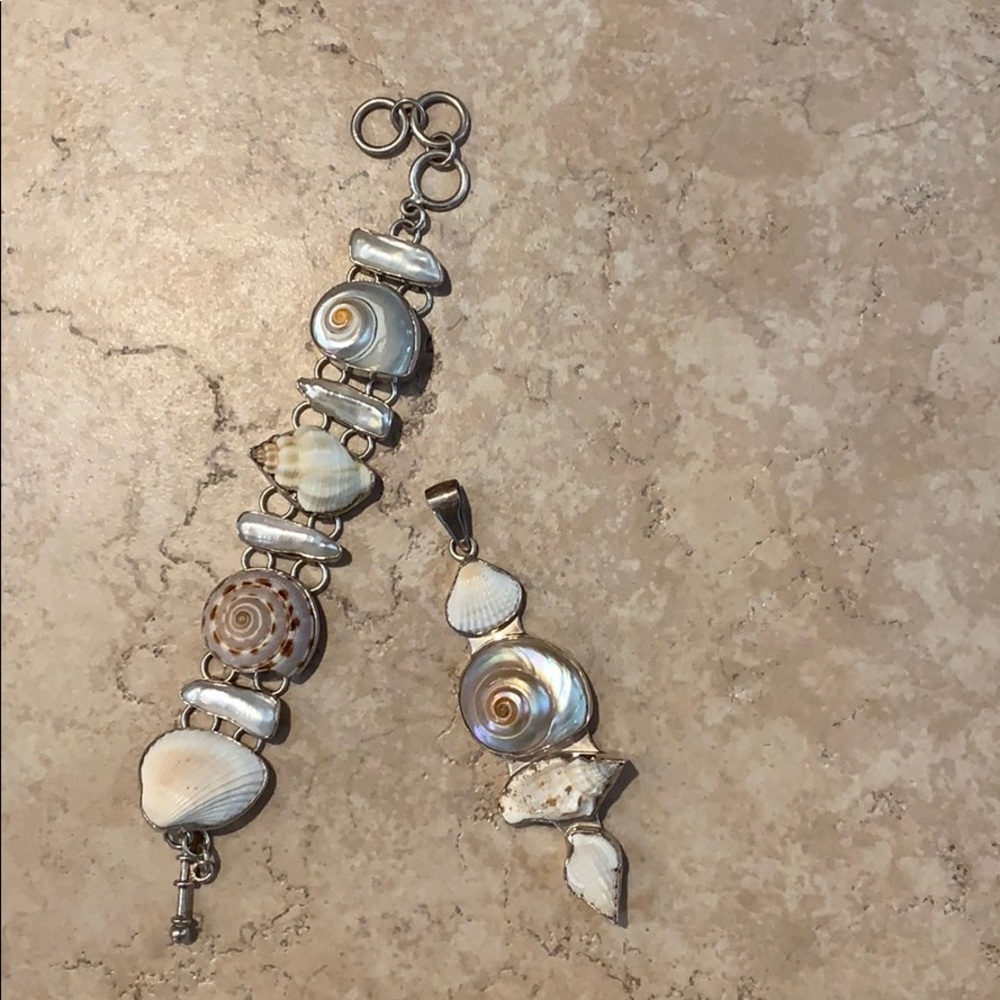 Shell bracelet and pendant.
